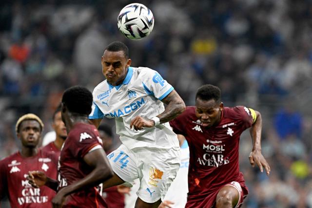 Marseille's Brazilian forward #14 Igor Paixao heads the ball during the French L1 football match between Olympique de Marseille (OM) and Metz FC at the Stade Velodrome in Marseille, southern France on April 10, 2026. (Photo by Gabriel BOUYS / AFP)