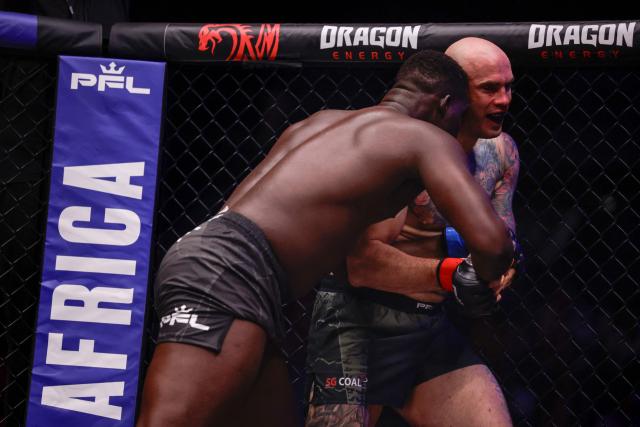 South Africa's Justin Clarke competes with Senegal's Abdoulaye Kane during the Professional Fighters League (PFL) heavyweight showcase co-main event at the SunBet Arena in Pretoria, on April 10, 2026. (Photo by ILARIA FINIZIO / AFP)