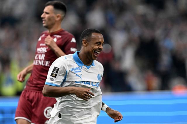 Marseille's Brazilian forward #14 Igor Paixao celebrates after scoring a goal during the French L1 football match between Olympique de Marseille (OM) and Metz FC at the Stade Velodrome in Marseille, southern France on April 10, 2026. (Photo by Gabriel BOUYS / AFP)