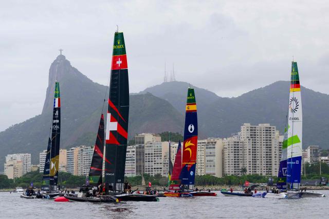TOPSHOT - (L-R) France, Switzerland, Spain, and Germany SailGP teams trains ahead of the Rio 2026 SailGP in Guanabara Bay in Rio de Janeiro, Brazil on April 10, 2026. (Photo by Pablo PORCIUNCULA / AFP)
