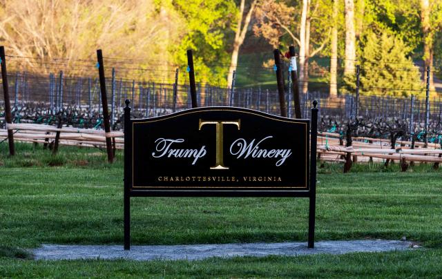 A Trump Winery sign is seen by the property entrance in Charlottesville, Virginia on April 10, 2026. President Trump is in Charlottesville, Virginia to attend a MAGA inc. meeting and dinner at Trump Winery. (Photo by Jim WATSON / AFP)