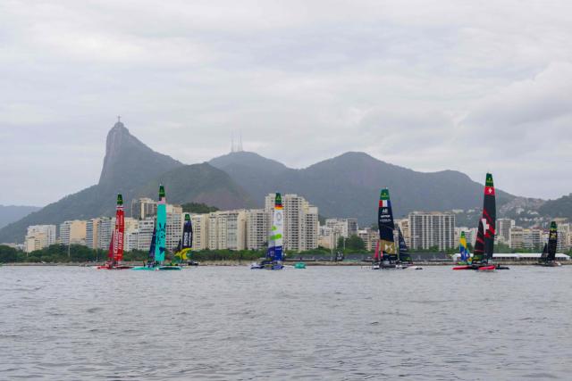 (L-R) Great Britain, United States, Australia, Germany, France, Brazil, Switzerland, and Sweden SailGP teams train ahead of the Rio 2026 SailGP in Guanabara Bay in Rio de Janeiro, Brazil on April 10, 2026. (Photo by Pablo PORCIUNCULA / AFP)