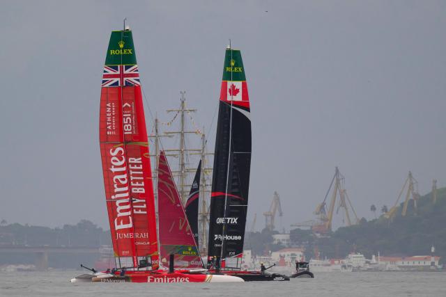 (L-R) Great Britain and Canada SailGP teams train ahead of the Rio 2026 SailGP in Guanabara Bay in Rio de Janeiro, Brazil on April 10, 2026. (Photo by Pablo PORCIUNCULA / AFP)