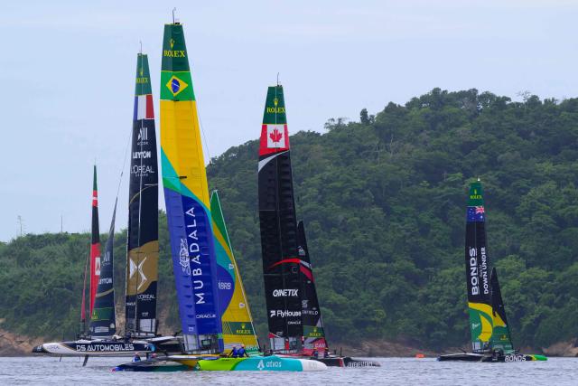 (L-R) Denmark, France, Brazil, Canada, and Australia SailGP teams train ahead of the Rio 2026 SailGP in Guanabara Bay in Rio de Janeiro, Brazil on April 10, 2026. (Photo by Pablo PORCIUNCULA / AFP)