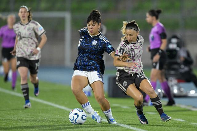Argentina's midfielder #05 Vanina Preininger and Chile's midfielder #10 Yanara Aedo fight for the ball during the CONMEBOL Nations League Women football match between Chile and Argentina at the Elias Figueroa stadium in Valparaiso, Chile on April 10, 2026. (Photo by Rodrigo ARANGUA / AFP)