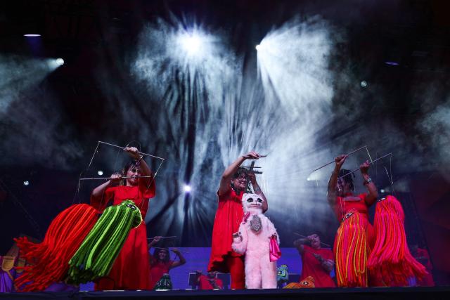 Puppeteers from the Bob Baker Marionette Theater perform onstage during the 2026 Coachella Valley Music and Arts Festival in Indio, California on April 10, 2026. (Photo by VALERIE MACON / AFP)
