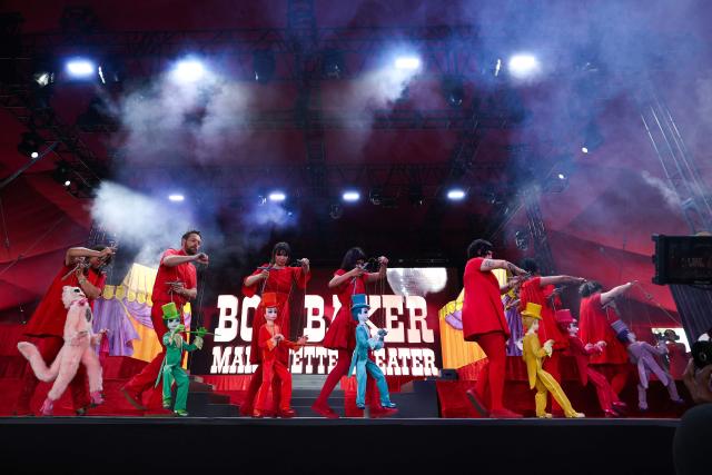 Puppeteers from the Bob Baker Marionette Theater perform onstage during the 2026 Coachella Valley Music and Arts Festival in Indio, California on April 10, 2026. (Photo by VALERIE MACON / AFP)