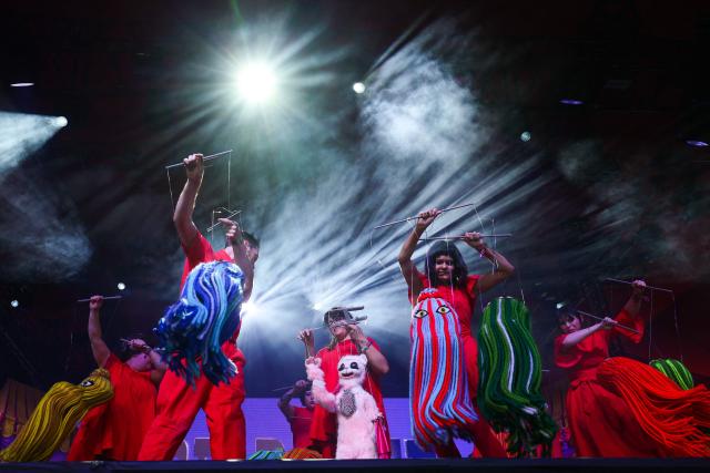Puppeteers from the Bob Baker Marionette Theater perform onstage during the 2026 Coachella Valley Music and Arts Festival in Indio, California on April 10, 2026. (Photo by VALERIE MACON / AFP)