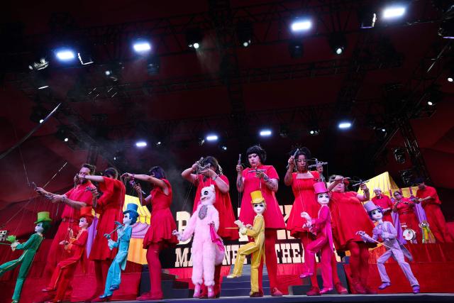 Puppeteers from the Bob Baker Marionette Theater perform onstage during the 2026 Coachella Valley Music and Arts Festival in Indio, California on April 10, 2026. (Photo by VALERIE MACON / AFP)