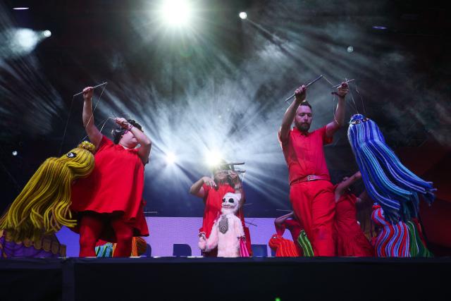 Puppeteers from the Bob Baker Marionette Theater perform onstage during the 2026 Coachella Valley Music and Arts Festival in Indio, California on April 10, 2026. (Photo by VALERIE MACON / AFP)