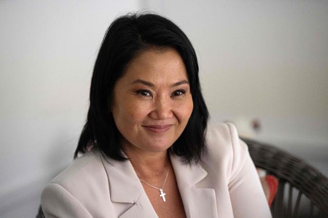 Peru's presidential candidate Keiko Fujimori, for the Fuerza Popular party, gestures during an interview with AFP at the party headquarters in Lima on April 10, 2026. Fujimori, the frontrunner in Peru's presidential race, vowed expel illegal migrants, attract US investment and extend a conservative tide sweeping power in Latin America, in an exclusive interview with AFP on April 10, 2026, on the eve of the April 12 election. (Photo by Ernesto BENAVIDES / AFP)