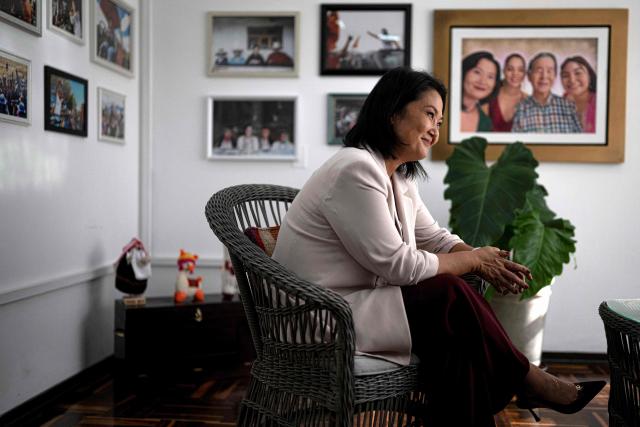 Peru's presidential candidate Keiko Fujimori, for the Fuerza Popular party, smiles during an interview with AFP at the party headquarters in Lima on April 10, 2026. Fujimori, the frontrunner in Peru's presidential race, vowed expel illegal migrants, attract US investment and extend a conservative tide sweeping power in Latin America, in an exclusive interview with AFP on April 10, 2026, on the eve of the April 12 election. (Photo by Ernesto BENAVIDES / AFP)