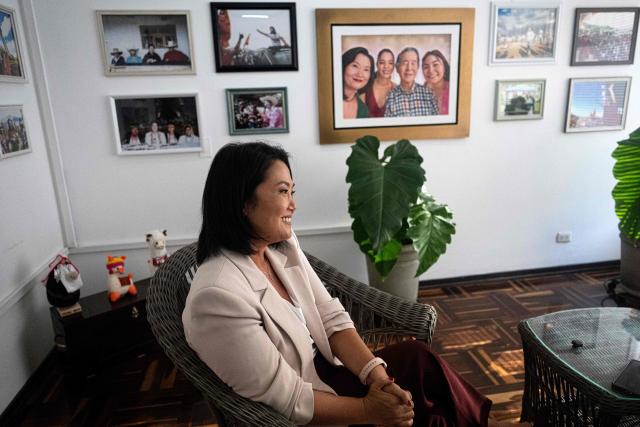 Peru's presidential candidate Keiko Fujimori, for the Fuerza Popular party, smiles during an interview with AFP at the party headquarters in Lima on April 10, 2026. Fujimori, the frontrunner in Peru's presidential race, vowed expel illegal migrants, attract US investment and extend a conservative tide sweeping power in Latin America, in an exclusive interview with AFP on April 10, 2026, on the eve of the April 12 election. (Photo by Ernesto BENAVIDES / AFP)