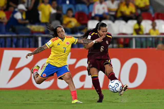 Colombia's forward #07 Manuela Pavi and Venezuela's defender #06 Michelle Romero fight for the ball during the CONMEBOL Nations League Women football match between Colombia and Venezuela at the Olímpico Pascual Guerrero stadium in Cali, Valle del Cauca, Colombia, on April 10, 2026. (Photo by JOAQUIN SARMIENTO / AFP)