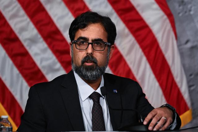 NASAs associate administrator Amit Kshatriya speaks during a press conference at Johnson Space Center in Houston, Texas, on April 10, 2026, after the Artemis II astronauts splashed down in the Pacific Ocean off the coast of California. The NASA spacecraft carrying four astronauts splashed down as planned April 10 off the California coast, capping the US space agency's successful crewed test mission around the Moon, the first such flyby in more than 50 years. Mission commander Reid Wiseman reported that the crewmembers -- himself along with Christina Koch, Victor Glover and Jeremy Hansen -- were "stable" and "green." (Photo by RONALDO SCHEMIDT / AFP)