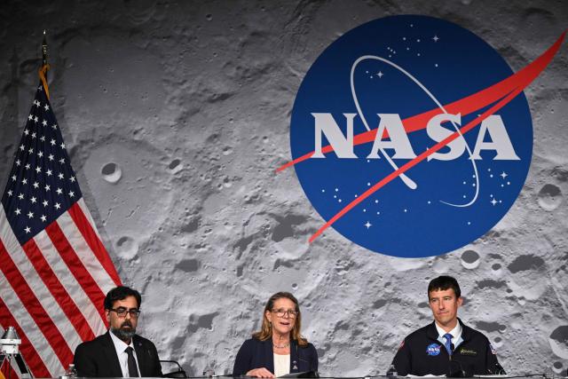 Lori Glaze (C), acting associate administrator for NASAs Exploration Systems Development Mission Directorate, speaks next to NASA's associate administrator Amit Kshatriya (L) and NASA flight director Rick Henfling (R), during a press conference at Johnson Space Center in Houston, Texas, on April 10, 2026, after the Artemis II astronauts splashed down in the Pacific Ocean off the coast of California. The NASA spacecraft carrying four astronauts splashed down as planned April 10 off the California coast, capping the US space agency's successful crewed test mission around the Moon, the first such flyby in more than 50 years. Mission commander Reid Wiseman reported that the crewmembers -- himself along with Christina Koch, Victor Glover and Jeremy Hansen -- were "stable" and "green." (Photo by RONALDO SCHEMIDT / AFP)