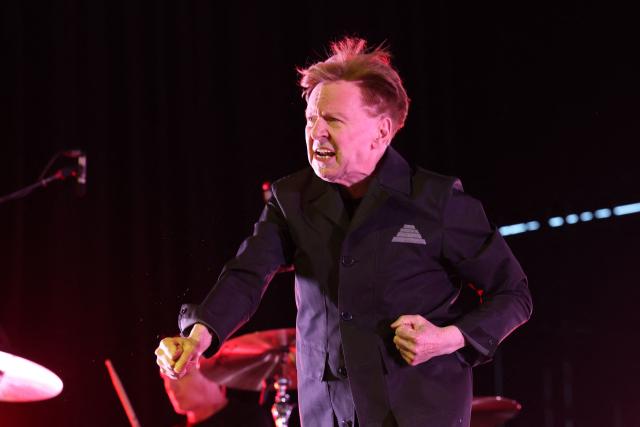 US singer and musician Gerald Casale of Devo performs on stage during the 2026 Coachella Valley Music and Arts Festival at the Empire Polo Club in Indio, California on April 10, 2026. (Photo by VALERIE MACON / AFP)