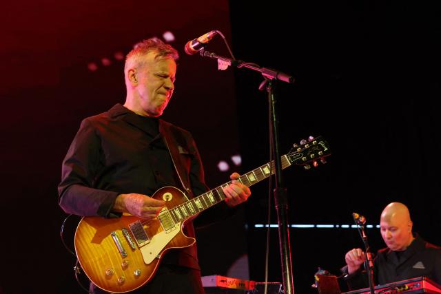 US musician Bob Mothersbaugh of Devo performs on stage during the 2026 Coachella Valley Music and Arts Festival at the Empire Polo Club in Indio, California on April 10, 2026. (Photo by VALERIE MACON / AFP)