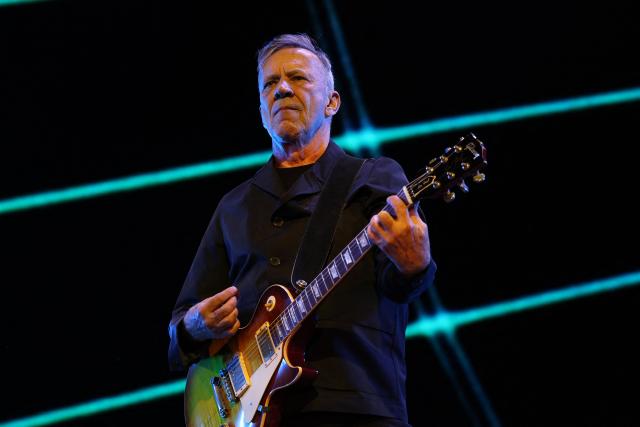 US musician Bob Mothersbaugh of Devo performs on stage during the 2026 Coachella Valley Music and Arts Festival at the Empire Polo Club in Indio, California on April 10, 2026. (Photo by VALERIE MACON / AFP)