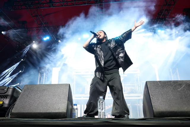 R-Shitei of Japanese hip-hop duo Creepy Nuts performs on the Gobi stage during the 2026 Coachella Valley Music and Arts Festival in Indio, California on April 10, 2026. (Photo by VALERIE MACON / AFP)
