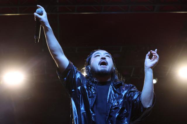 R-Shitei of Japanese hip-hop duo Creepy Nuts performs on the Gobi stage during the 2026 Coachella Valley Music and Arts Festival in Indio, California on April 10, 2026. (Photo by VALERIE MACON / AFP)