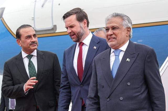 US Vice President JD Vance (C) speaks with Army Chief and Field Marshal Syed Asim Munir (L) and Pakistan's Foreign Minister Ishaq Dar after arriving for the US-Iran peace talks in Islamabad on April 11, 2026. US Vice President JD Vance arrived in Islamabad on April 11 for talks with Iran that the Pakistani premier hosting the warring sides called a "make or break" effort to permanently halt weeks of fighting in the Middle East. (Photo by Jacquelyn MARTIN / POOL / AFP)
