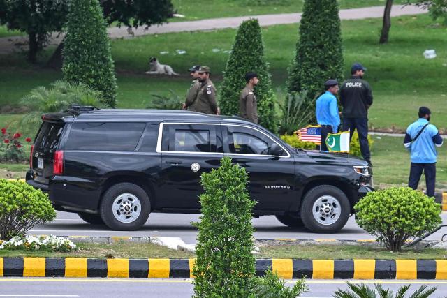 A motorcade believed to be carrying US Vice President JD Vance makes its way ahead of US-Iran peace talks in Islamabad on April 11, 2026. US Vice President JD Vance arrived in Islamabad on April 11 for talks with Iran that the Pakistani premier hosting the warring sides called a "make or break" effort to permanently halt weeks of fighting in the Middle East. (Photo by Aamir QURESHI / AFP)