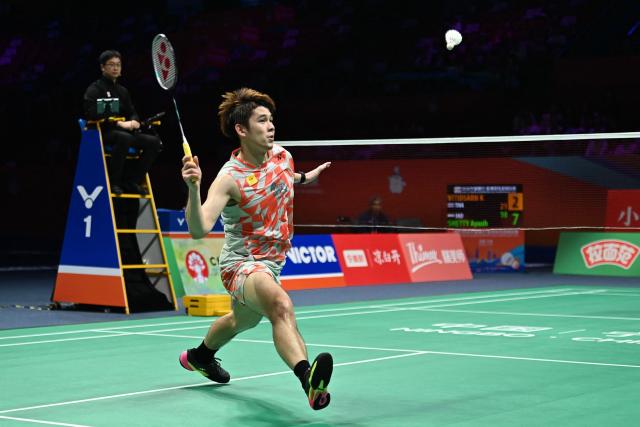 Thailand's Kunlavut Vitidsarn hits a return to India's Ayush Shetty during their men's singles semifinal match at the Badminton Asia Championship in Ningbo, eastern China's Zhejiang province on April 11, 2026. (Photo by CN-STR / AFP) / China OUT