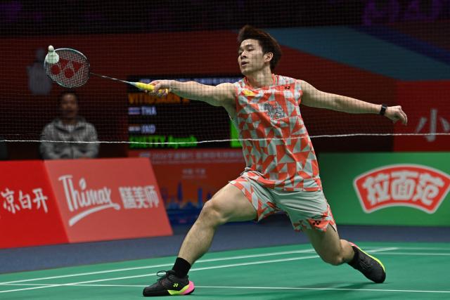 Thailand's Kunlavut Vitidsarn hits a return to India's Ayush Shetty during their men's singles semifinal match at the Badminton Asia Championship in Ningbo, eastern China's Zhejiang province on April 11, 2026. (Photo by CN-STR / AFP) / China OUT