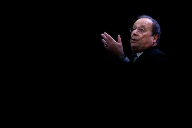 Socialistes et Apparentes' MP Francois Hollande delivers a speech during a debate session of the “Grand Dйbat des Gracques” on major national issues, at the Theatre de la Cite Internationale in Paris on April 11, 2026. (Photo by Ian LANGSDON / AFP)