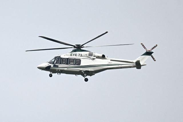 A Pakistani government helicopter flies over the Red Zone area ahead of US-Iran peace talks in Islamabad on April 11, 2026. US Vice President JD Vance arrived in Islamabad on April 11 for talks with Iran that the Pakistani premier hosting the warring sides called a "make or break" effort to permanently halt weeks of fighting in the Middle East. (Photo by Aamir QURESHI / AFP)
