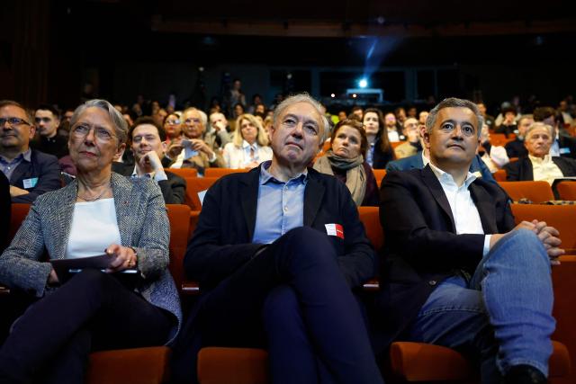 (From L) Ensemble Pour la Republique's MP Elisabeth Borne, Les Gracques' president Bernard Spitz and France's Justice Minister Gerald Darmanin attend a debate session of the “Grand Dйbat des Gracques” on major national issues, at the Theatre de la Cite Internationale in Paris on April 11, 2026. (Photo by Ian LANGSDON / AFP)