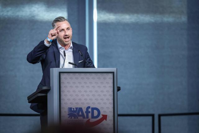 The far-right Alternative for Germany (AfD) party's top candidate for regional elections Ulrich Siegmund gives a speech during the AfD's regional congress in Magdeburg, eastern Germany, on April 11, 2026. The AfD in the eastern federal state of Saxony-Anhalt holds a two-day party convention to prepare regional elections scheduled for September 6, 2026. (Photo by RONNY HARTMANN / AFP)