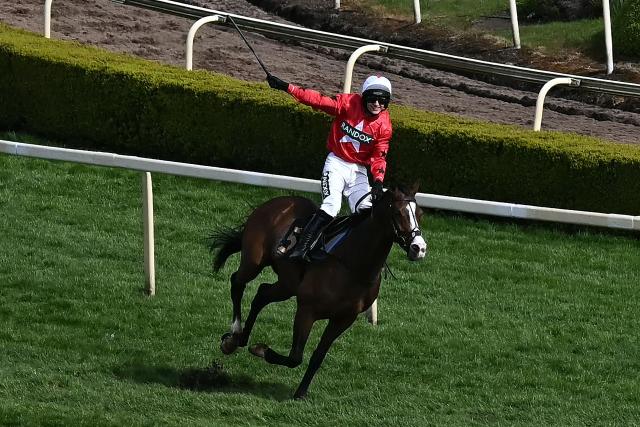 Mirabad with jockey Tristan Durrell wins the first race on the final day of the Grand National Festival horse race meeting at Aintree Racecourse in Liverpool, north-west England on April 11, 2026. (Photo by Paul ELLIS / AFP)