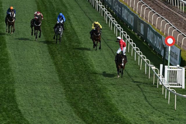Mirabad with jockey Tristan Durrell (R) wins the first race on the final day of the Grand National Festival horse race meeting at Aintree Racecourse in Liverpool, north-west England on April 11, 2026. (Photo by Paul ELLIS / AFP)
