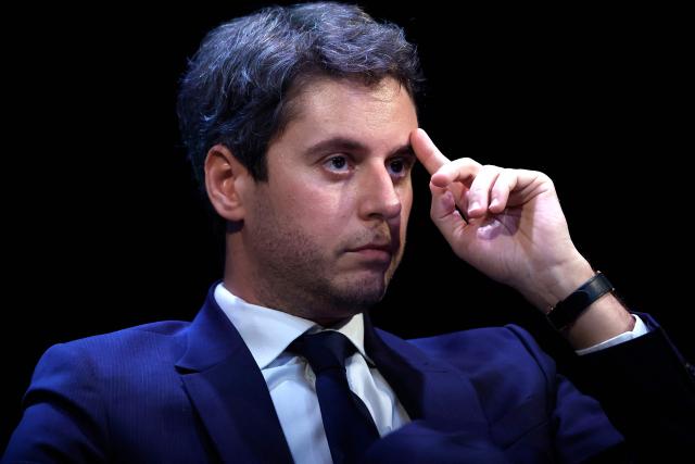 General Secretary of French centrist party Renaissance Gabriel Attal attends a debate session of the “Grand Dйbat des Gracques” on major national issues, at the Theatre de la Cite Internationale in Paris on April 11, 2026. (Photo by Ian LANGSDON / AFP)