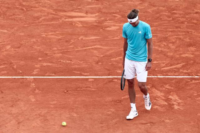 Germany's Alexander Zverev reacts as he plays against Italy's Jannik Sinner during the Monte Carlo ATP Masters Series Tournament semi-final tennis match on Court Rainier III at the Monte-Carlo Country Club in Roquebrune-Cap-Martin, south-eastern France on April 11, 2026. (Photo by Thibaud MORITZ / AFP)