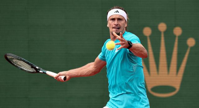 Germany's Alexander Zverev plays a forehand return to Italy's Jannik Sinner during the Monte Carlo ATP Masters Series Tournament semi-final tennis match on Court Rainier III at the Monte-Carlo Country Club in Roquebrune-Cap-Martin, south-eastern France on April 11, 2026. (Photo by Thibaud MORITZ / AFP)