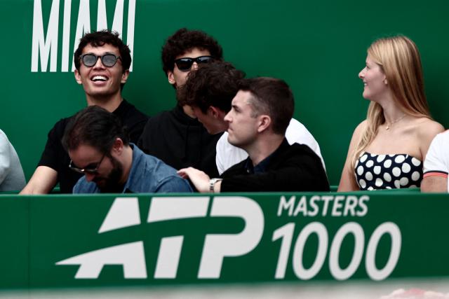 Thailand's F1 driver Alexander Albon (L) reacts as he attends the Monte Carlo ATP Masters Series Tournament semi-final tennis match between Italy's Jannik Sinner and Germany's Alexander Zverev on Court Rainier III at the Monte-Carlo Country Club in Roquebrune-Cap-Martin, south-eastern France on April 11, 2026. (Photo by Thibaud MORITZ / AFP)