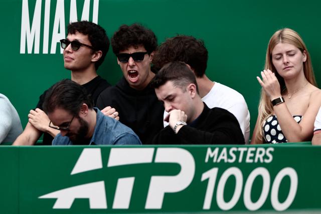 Thailand's F1 driver Alexander Albon (L) and Brazilian F1 driver Gabriel Bortoleto (2nd L) attend the Monte Carlo ATP Masters Series Tournament semi-final tennis match between Italy's Jannik Sinner and Germany's Alexander Zverev on Court Rainier III at the Monte-Carlo Country Club in Roquebrune-Cap-Martin, south-eastern France on April 11, 2026. (Photo by Thibaud MORITZ / AFP)