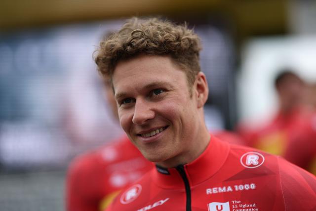 Uno-X Mobility's Norwegian rider Jonas Abrahamsen attends the teams' presentations event on the eve of the 123rd edition of the Paris-Roubaix one-day classic cycling race, 258.3 km between Compiegne and Roubaix, in Compiegne, northern France, on April 11, 2026. (Photo by Anne-Christine POUJOULAT / AFP)