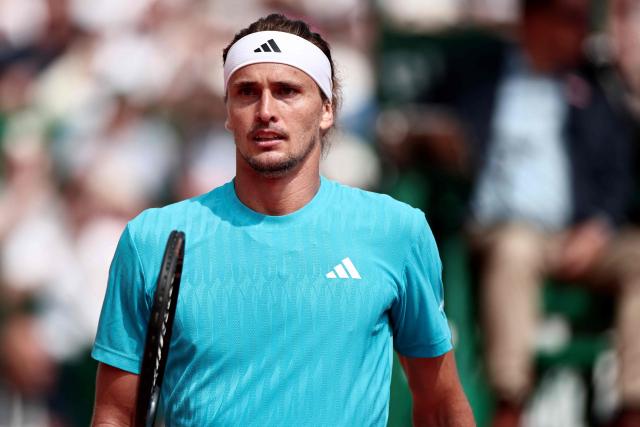 Germany's Alexander Zverev reacts as he plays against Italy's Jannik Sinner during the Monte Carlo ATP Masters Series Tournament semi-final tennis match on Court Rainier III at the Monte-Carlo Country Club in Roquebrune-Cap-Martin, south-eastern France on April 11, 2026. (Photo by Thibaud MORITZ / AFP)