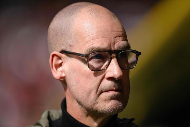 Borussia Dortmund CEO Carsten Cramer is interviewed prior to the German first division Bundesliga football match between Borussia Dortmund and Bayer Leverkusen in Dortmund, western Germany, on April 11, 2026. (Photo by INA FASSBENDER / AFP) / DFL REGULATIONS PROHIBIT ANY USE OF PHOTOGRAPHS AS IMAGE SEQUENCES AND/OR QUASI-VIDEO