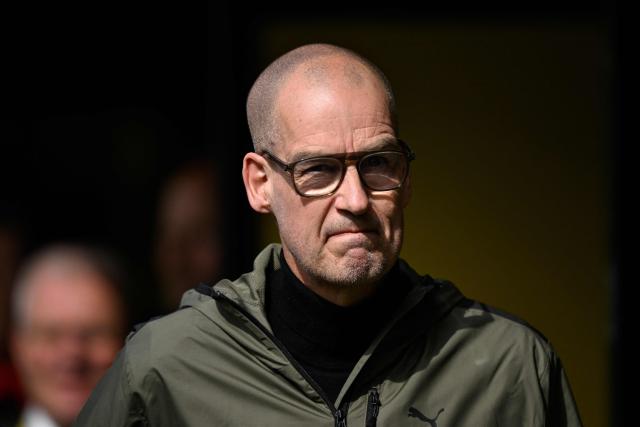 Borussia Dortmund CEO Carsten Cramer arrives prior to the German first division Bundesliga football match between Borussia Dortmund and Bayer Leverkusen in Dortmund, western Germany, on April 11, 2026. (Photo by INA FASSBENDER / AFP) / DFL REGULATIONS PROHIBIT ANY USE OF PHOTOGRAPHS AS IMAGE SEQUENCES AND/OR QUASI-VIDEO