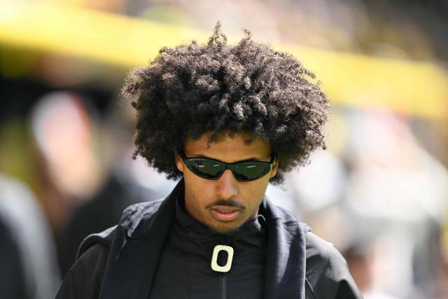 Dortmund's German forward #27 Karim Adeyemi arrives prior to the German first division Bundesliga football match between Borussia Dortmund and Bayer Leverkusen in Dortmund, western Germany, on April 11, 2026. (Photo by INA FASSBENDER / AFP) / DFL REGULATIONS PROHIBIT ANY USE OF PHOTOGRAPHS AS IMAGE SEQUENCES AND/OR QUASI-VIDEO