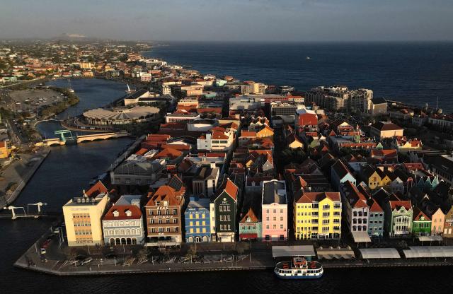 Aerial view showing the historical center in Willemstad, in the Dutch Caribbean, on April 10, 2026. (Photo by Raul ARBOLEDA / AFP)