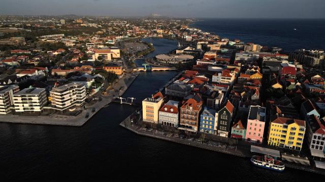 Aerial view showing the historical center in Willemstad, in the Dutch Caribbean, on April 10, 2026. (Photo by Raul ARBOLEDA / AFP)