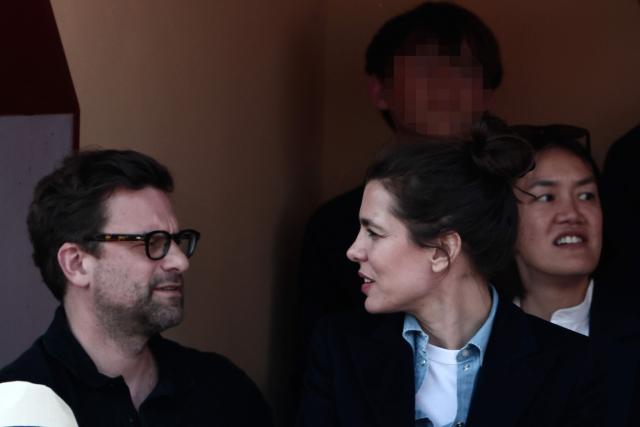 Charlotte Casiraghi (Bottom-R) and her partner French writer Nicolas Mathieu (Bottom-L) react ahead of the Monte Carlo ATP Masters Series Tournament semi-final tennis match between Spain's Carlos Alcaraz and Monaco's Valentin Vacherot on Court Rainier III at the Monte-Carlo Country Club in Roquebrune-Cap-Martin, south-eastern France on April 11, 2026. (Photo by Thibaud MORITZ / AFP) / / NO TABLOIDS WEB & PRINT, NO DAILY MAIL, NO DAILY MAIL GROUP, NO VOICI, NO CLOSER