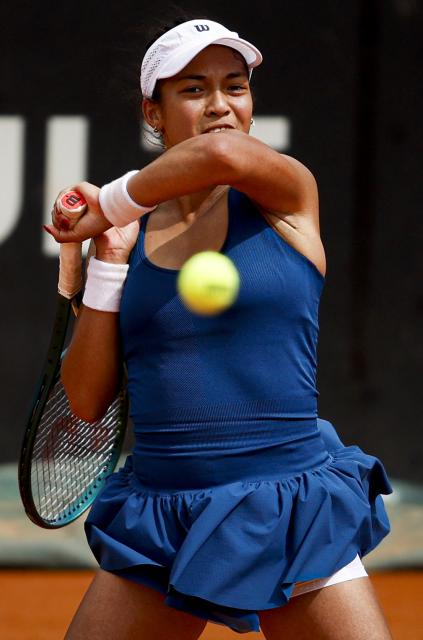France's Tiantsoa Sarah "Titi" Rakotomanga Rajaonah returns the ball against Serbia's Teodora Kostovic during their Billie Jean King Cup Group I Europe/Africa play-offs women's singles tennis match in Oeiras, on the outskirts of Lisbon, on April 11, 2026. (Photo by FILIPE AMORIM / AFP)