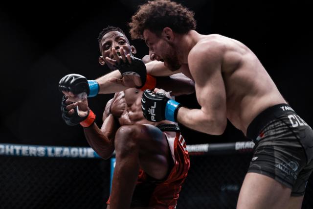 South Africa’s Nkosi Ndebele (L) competes against Italy’s Michele Clemente (R) during the Professional Fighters League (PFL) bantamweight showcase main event at the SunBet Arena in Pretoria, on April 10, 2026. (Photo by ILARIA FINIZIO / AFP)